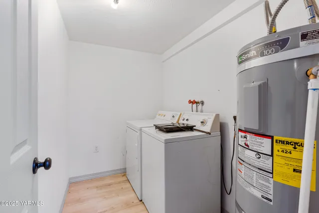 a kitchen with stainless steel appliances a stove a refrigerator and a sink