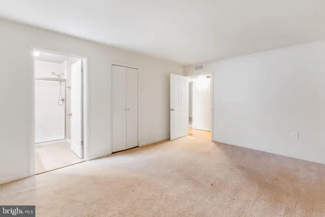 an empty room with windows