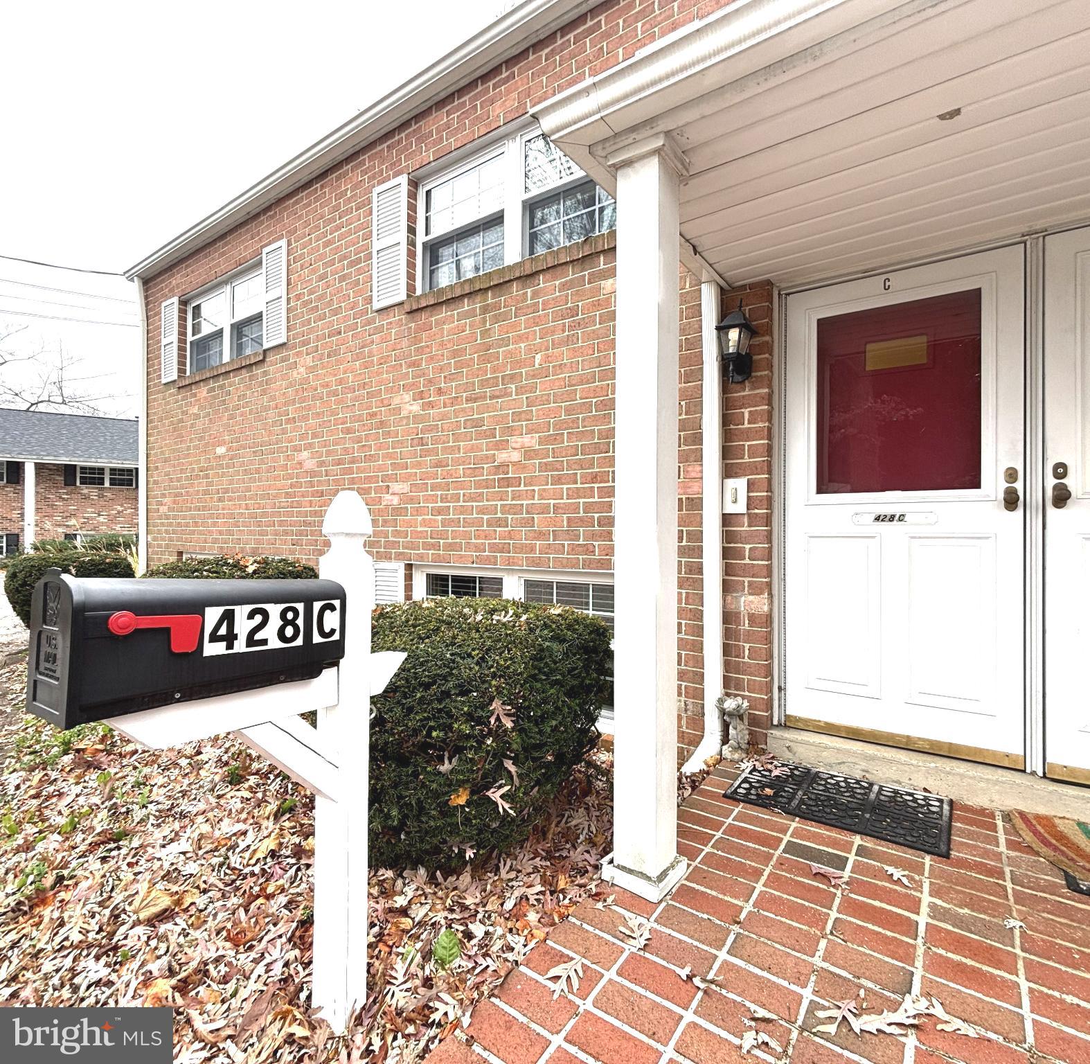428 Montemar Avenue, Unit C Catonsville, MD 21228 - Photo 3 of 19 Charming entrance with classic brick facade.