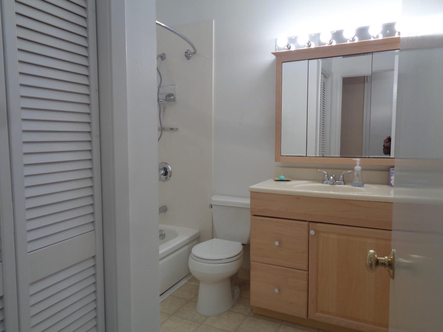 127 Dogwood Place San Ramon, CA 94583 - Photo 5 of 10 a bathroom with a sink a toilet and shower