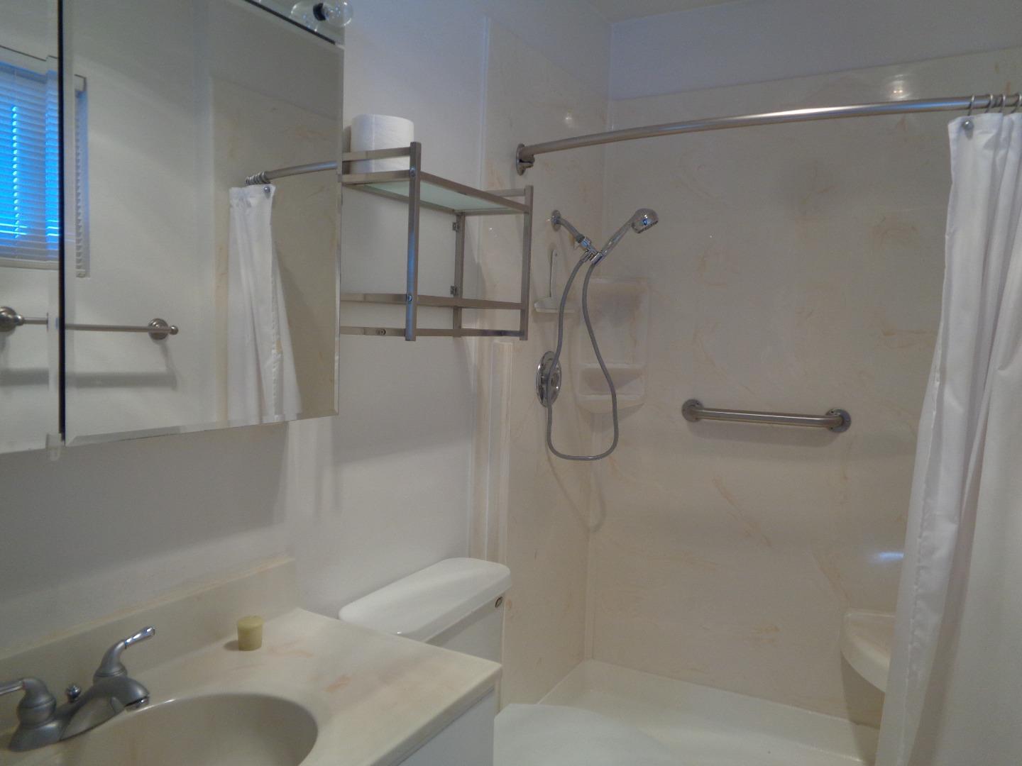 127 Dogwood Place San Ramon, CA 94583 - Photo 6 of 10 a bathroom with a shower and a sink