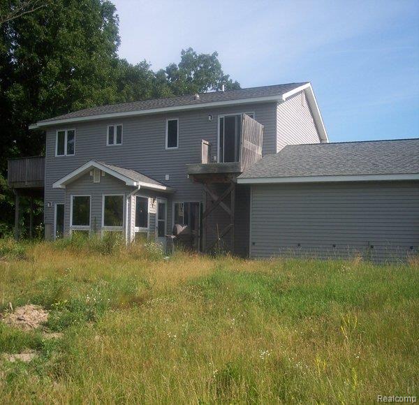 8297 West Sargent Road Fowlerville, MI 48836 - Photo 2 of 7 Back