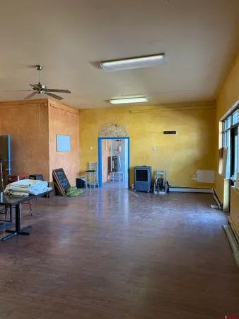 a view of game room with windows