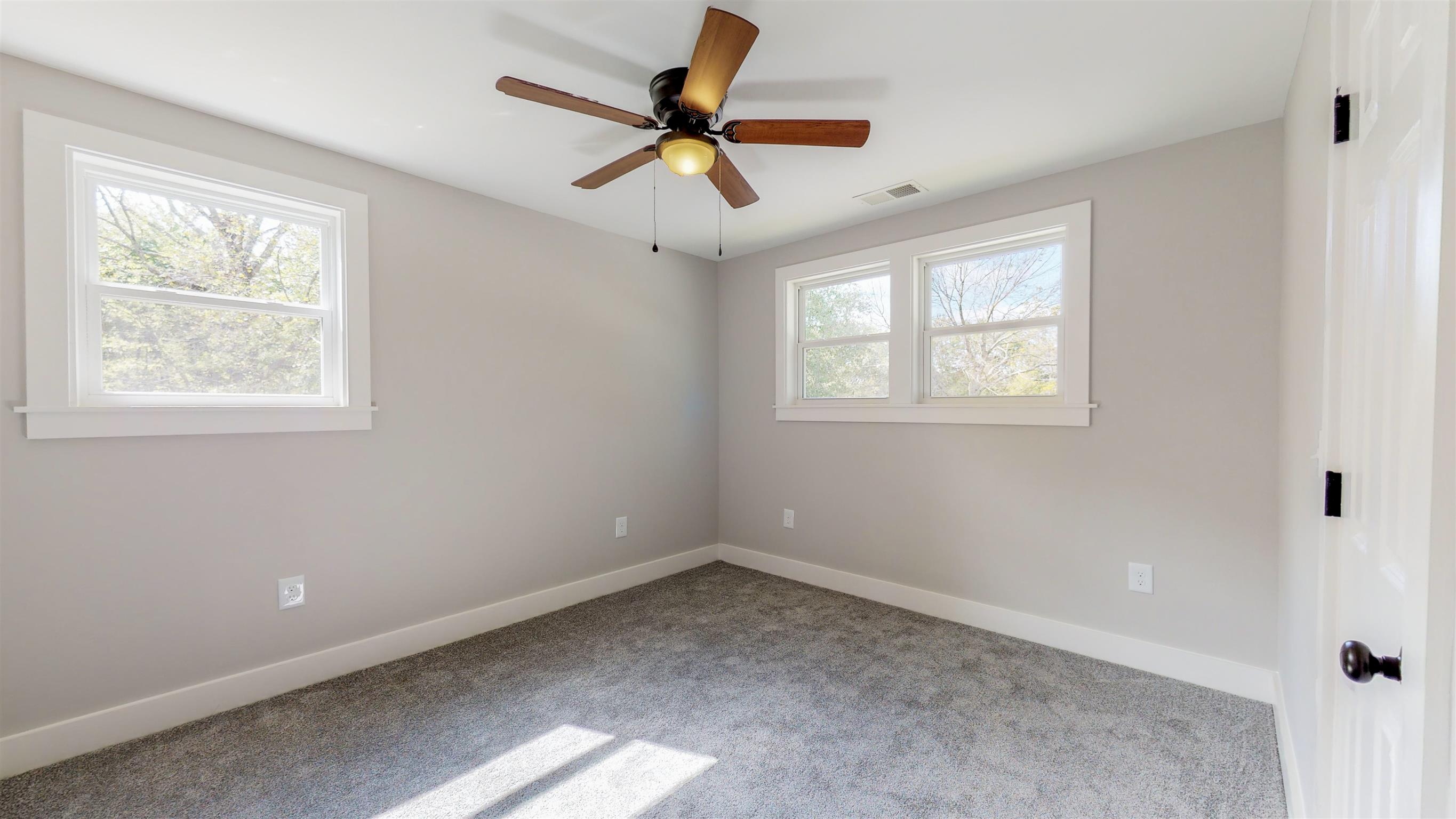 110 Green Acres Road Cottontown, TN 37048 - Photo 15 of 28 a view of room with a ceiling fan and window