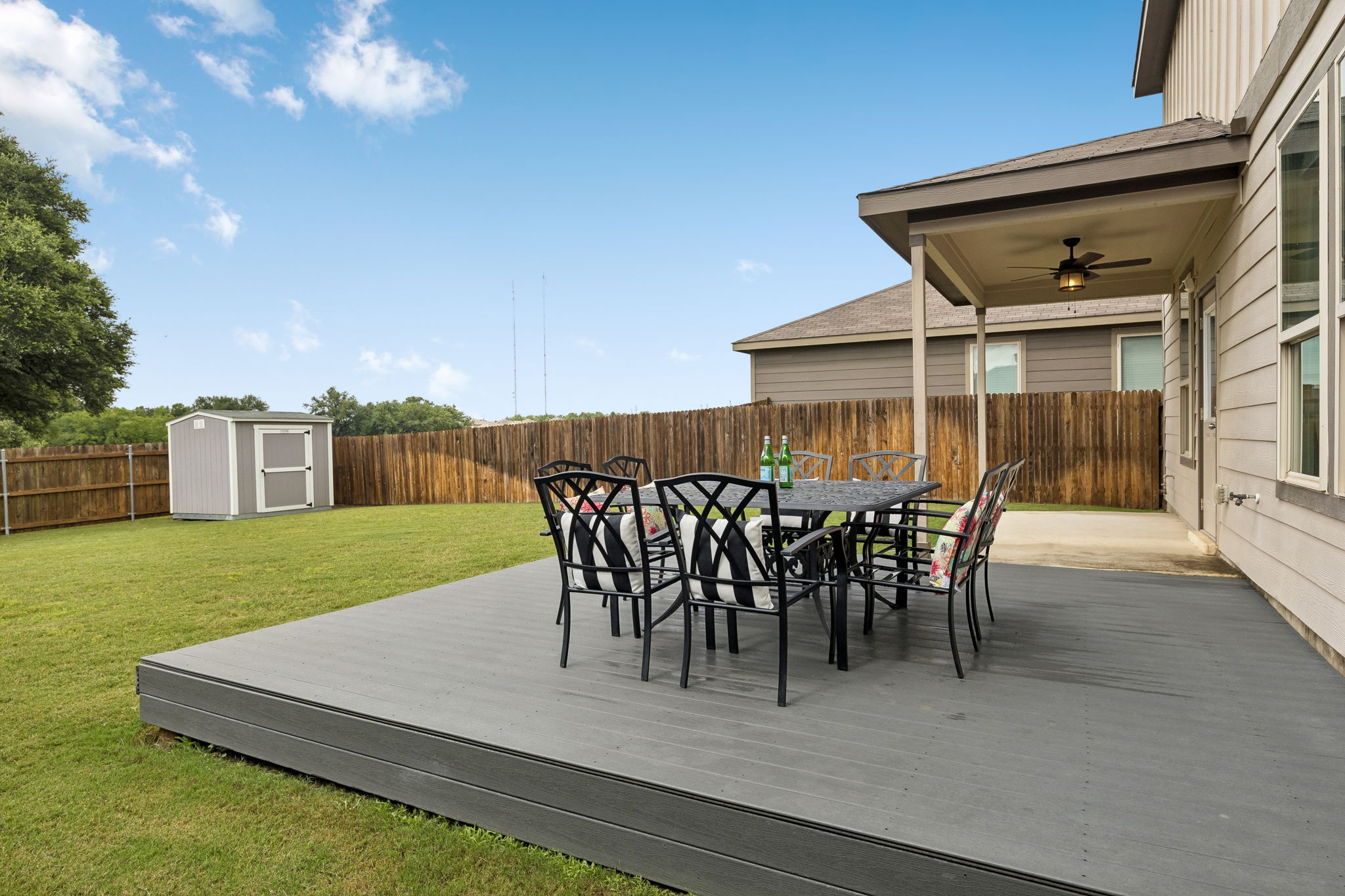 809 Whitman Avenue Georgetown, TX 78626 - Photo 31 of 35 a view of a patio with table and chairs and potted plants