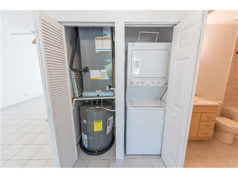 3150 Leewood Terrace, Unit L224 Boca Raton, FL 33431 - Photo 14 of 14 a bathroom with a toilet and a sink