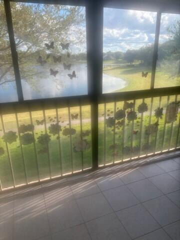 3150 Leewood Terrace, Unit L224 Boca Raton, FL 33431 - Photo 9 of 14 a view of outdoor space with windows