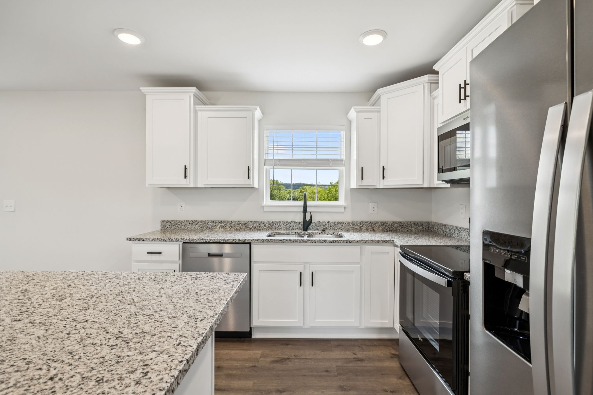 0 Alice Preston Loop Gordonsville, TN 38563 - Photo 12 of 25 a kitchen with stainless steel appliances granite countertop a sink stove and refrigerator