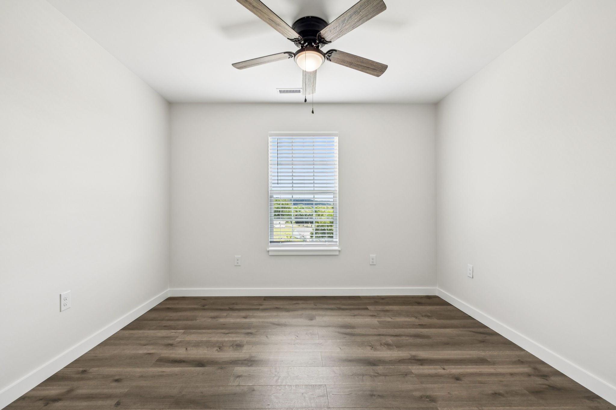0 Alice Preston Loop Gordonsville, TN 38563 - Photo 23 of 25 a view of empty room with wooden floor and fan