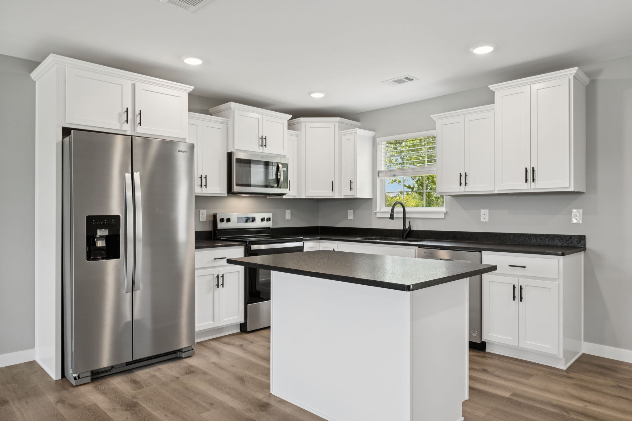 0 Alice Preston Loop Gordonsville, TN 38563 - Photo 10 of 25 a kitchen with stainless steel appliances granite countertop a refrigerator a stove a sink and white cabinets