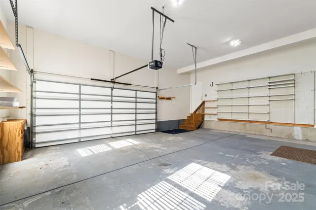 a view of a garage with stairs