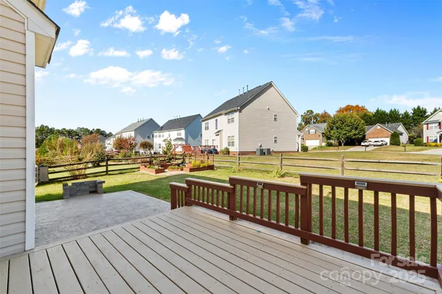 a view of a swimming pool with a lounge chair