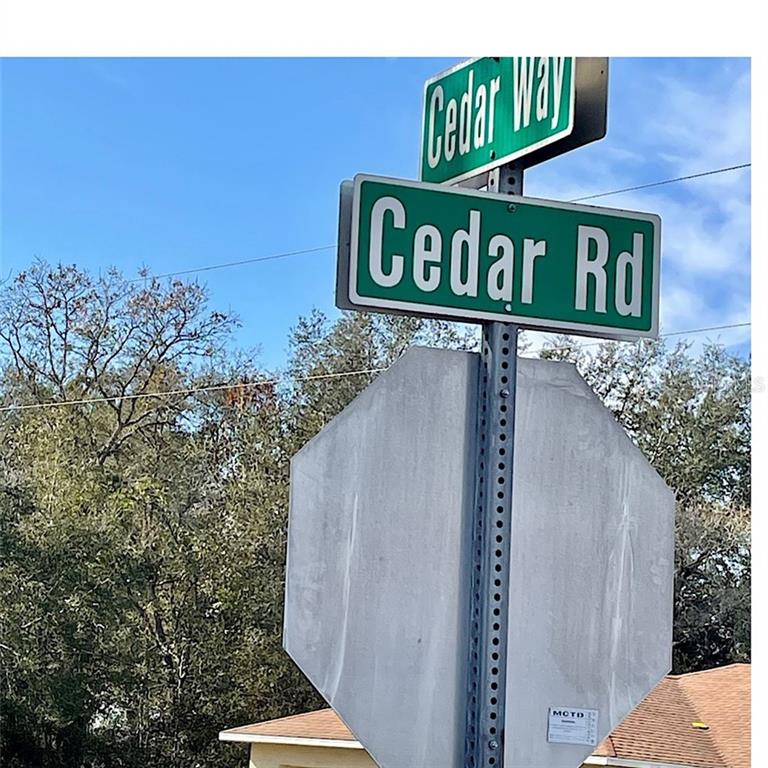 Tbd Tbd Cedar Ocala, FL 34472 - Photo 1 of 1 a street sign on a pole
