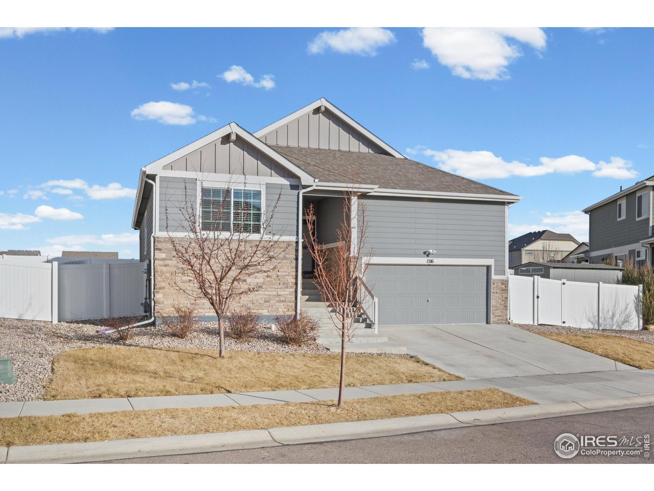 1216 Muskox Street Severance, CO 80550 - Photo 2 of 37 a view of a house with a backyard