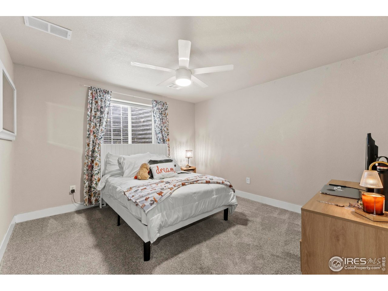 1216 Muskox Street Severance, CO 80550 - Photo 30 of 37 a bedroom with a bed and window