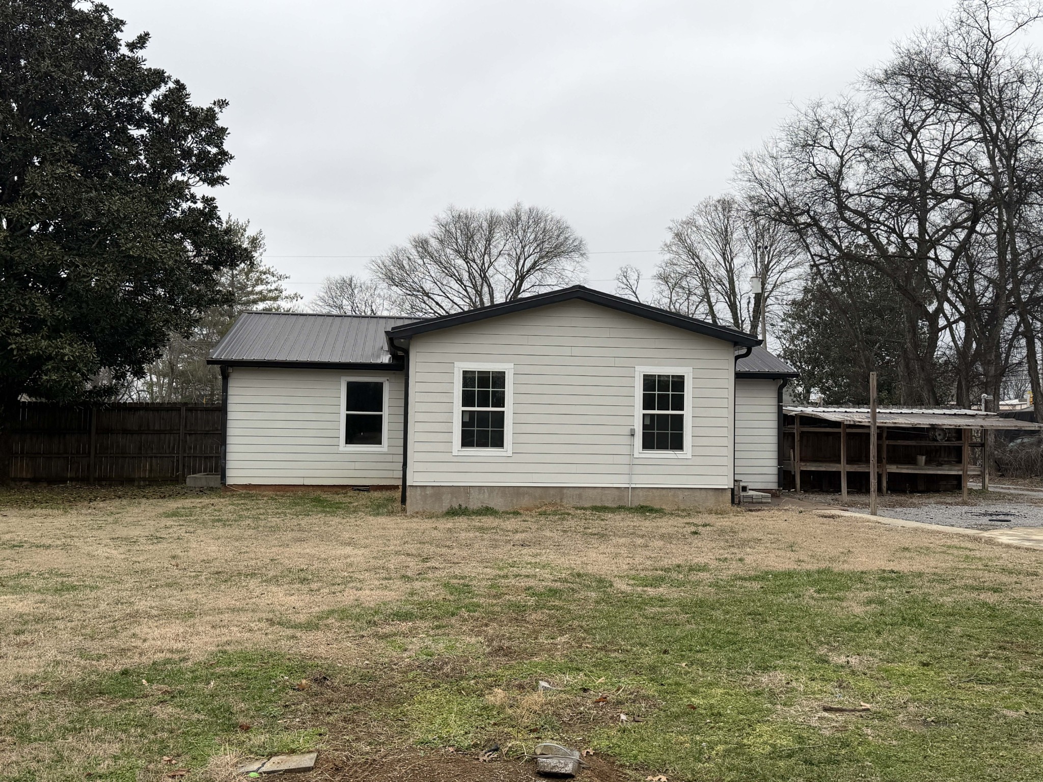 4698 Mandy Lane Murfreesboro, TN 37129 - Photo 2 of 6 a house with trees in the background
