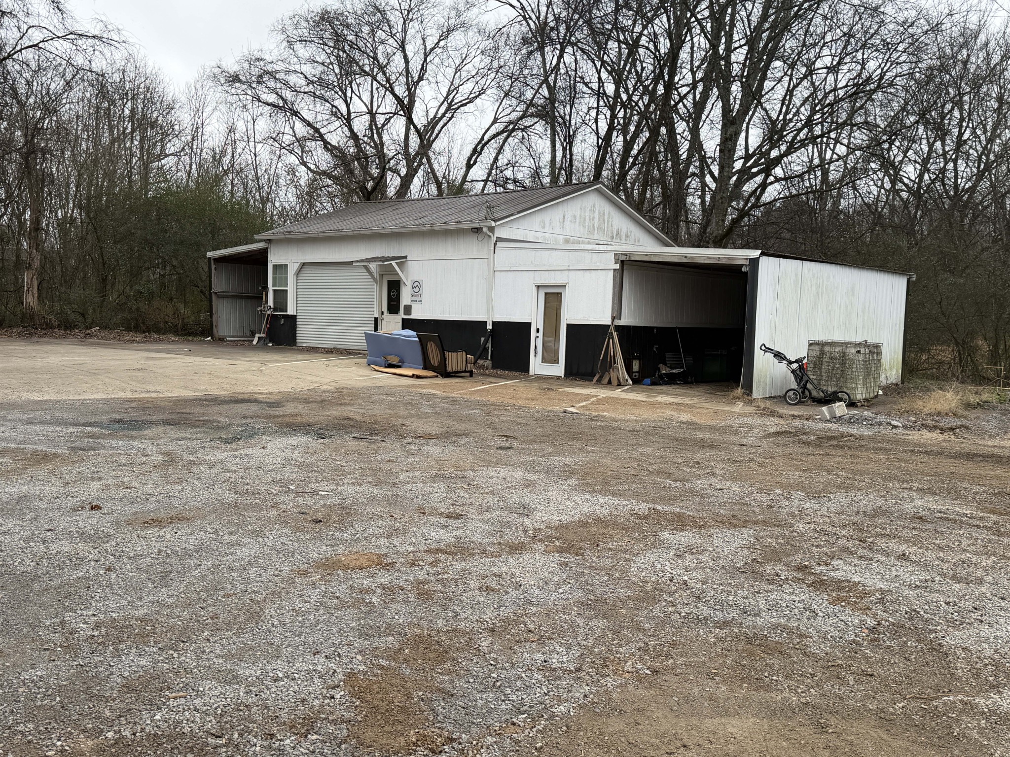 4698 Mandy Lane Murfreesboro, TN 37129 - Photo 3 of 6 a front view of a house with a yard and garage