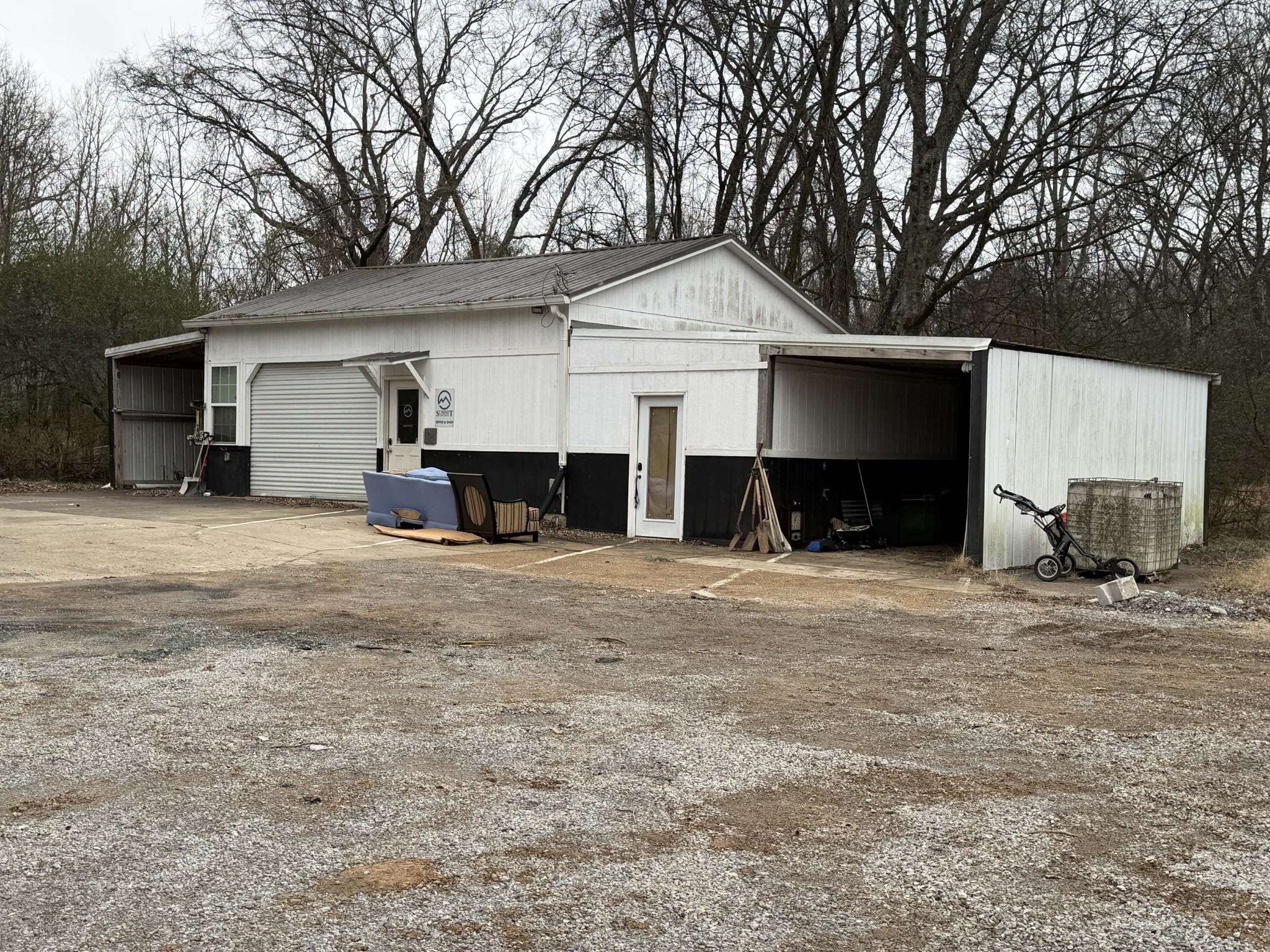 4698 Mandy Lane Murfreesboro, TN 37129 - Photo 4 of 6 a front view of a house with a yard and garage