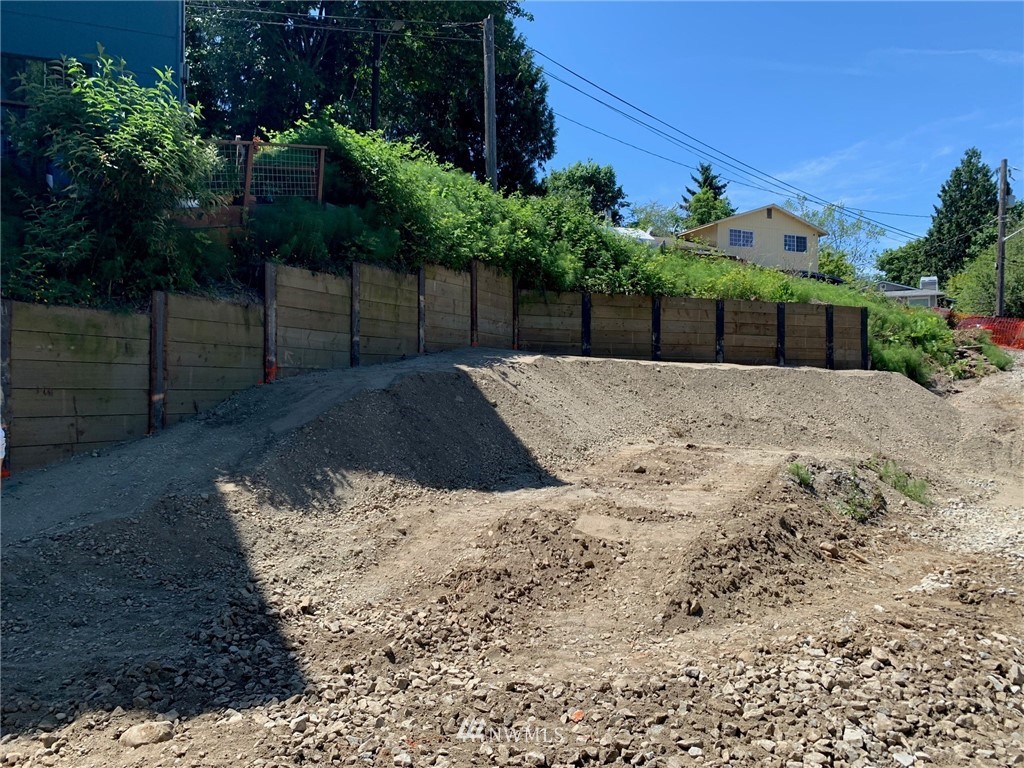 5052 Renton Avenue South Seattle, WA 98118 - Photo 11 of 11 a view of a yard with wooden fence