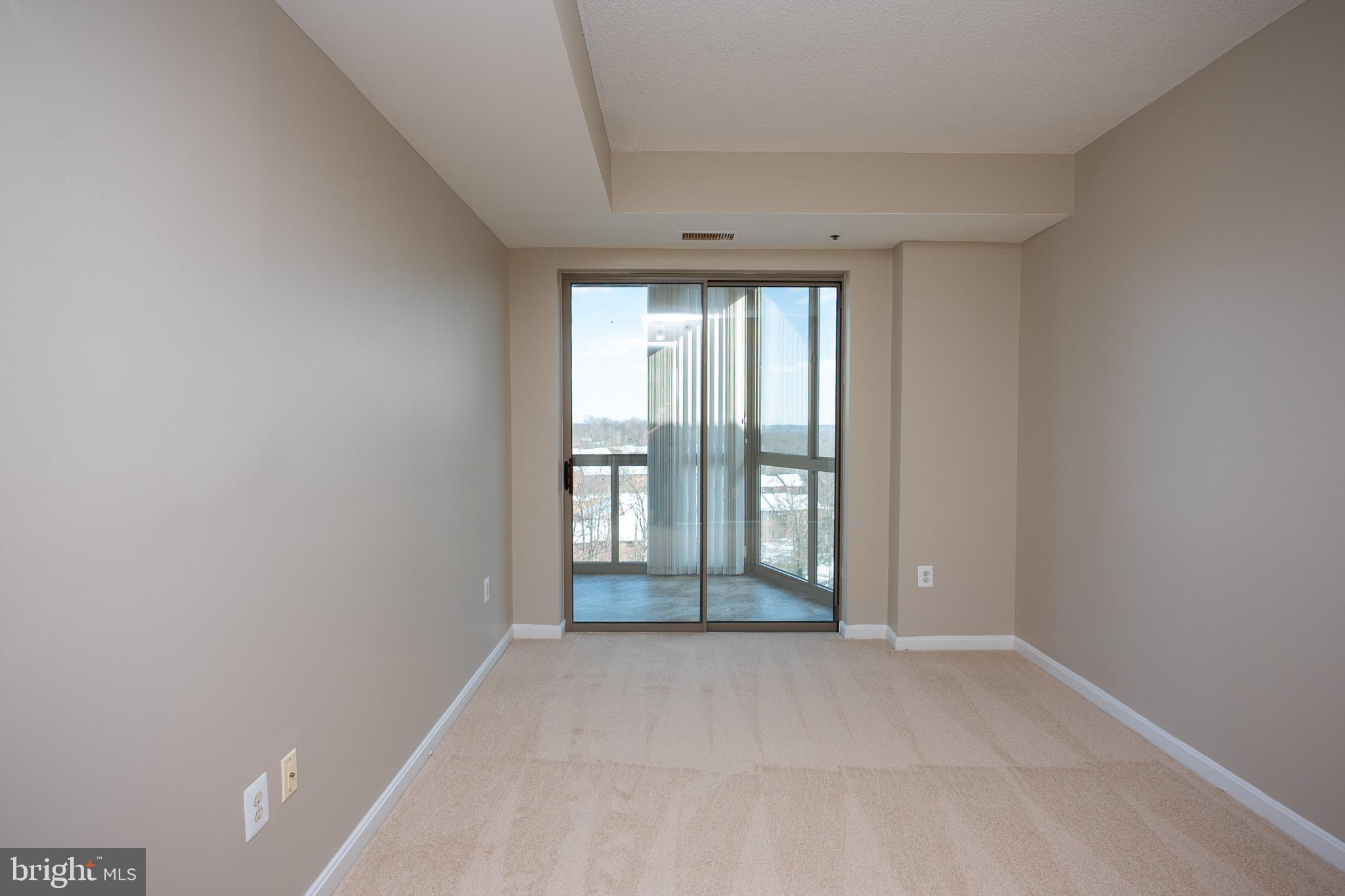 3200 North Leisure World Boulevard, Unit 1007 Silver Spring, MD 20906 - Photo 21 of 36 Second Bedroom with New Carpet