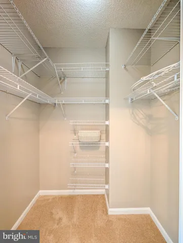 a view of an empty walk in closet