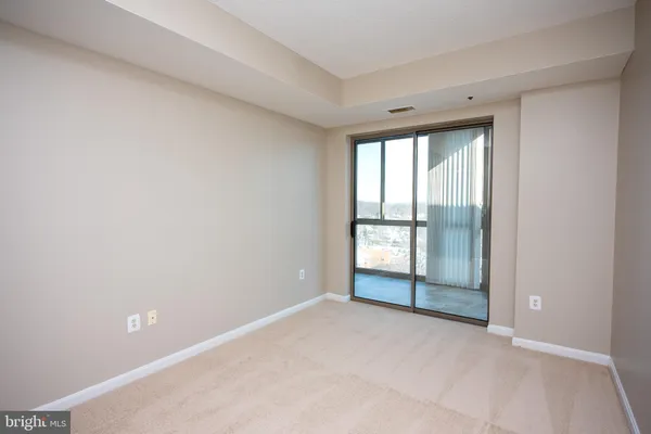 wooden floor and windows in an empty room
