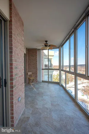 a view of an empty room with a sliding door