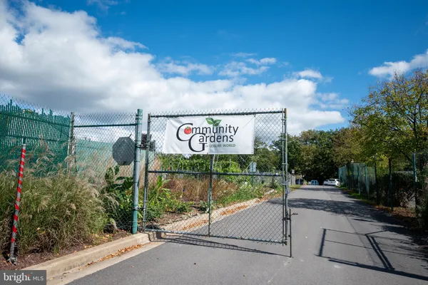 a view of a street with sign on the side of it