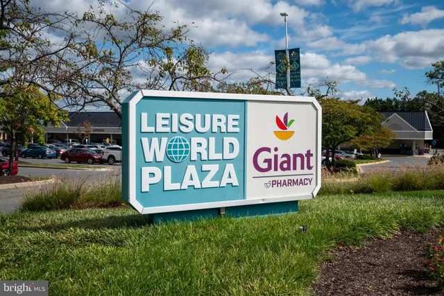 a view of outdoor space with signage and flags