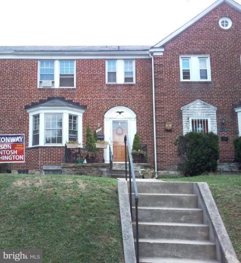 1515 Kingsway Road Baltimore, MD 21218 - Photo 1 of 1 a front view of a house with garden
