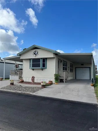a front view of a house with a patio
