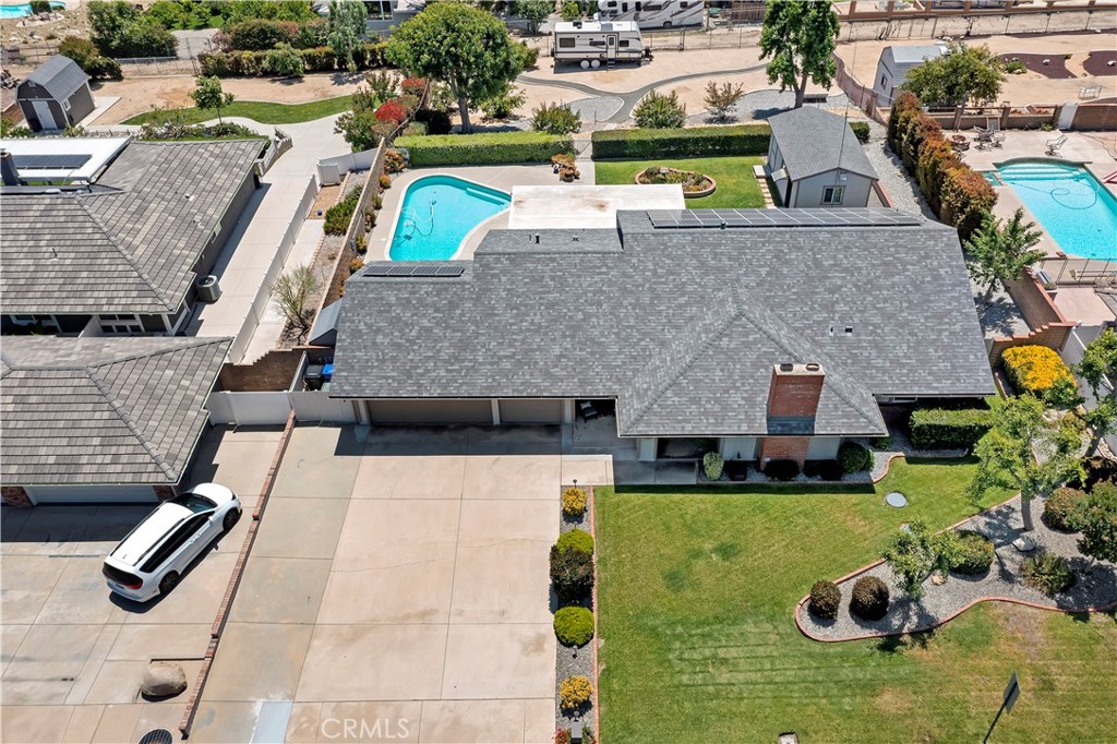 8527 Hillside Road Rancho Cucamonga, CA 91701 - Photo 38 of 50 an aerial view of a house with yard swimming pool and outdoor seating