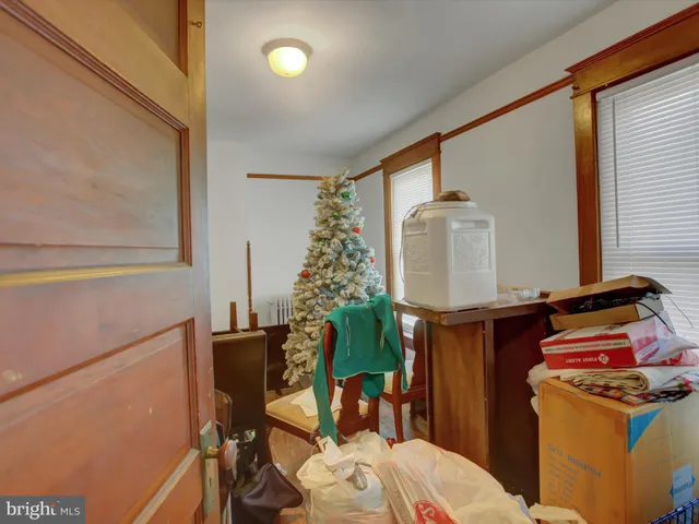 a room with furniture and garden view