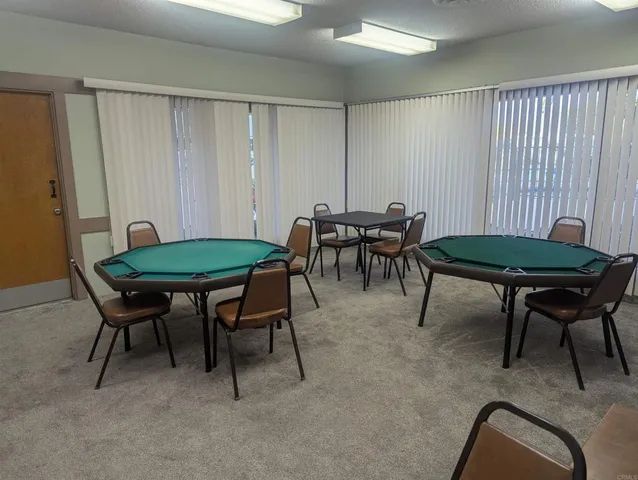 a living room with couch and a large window