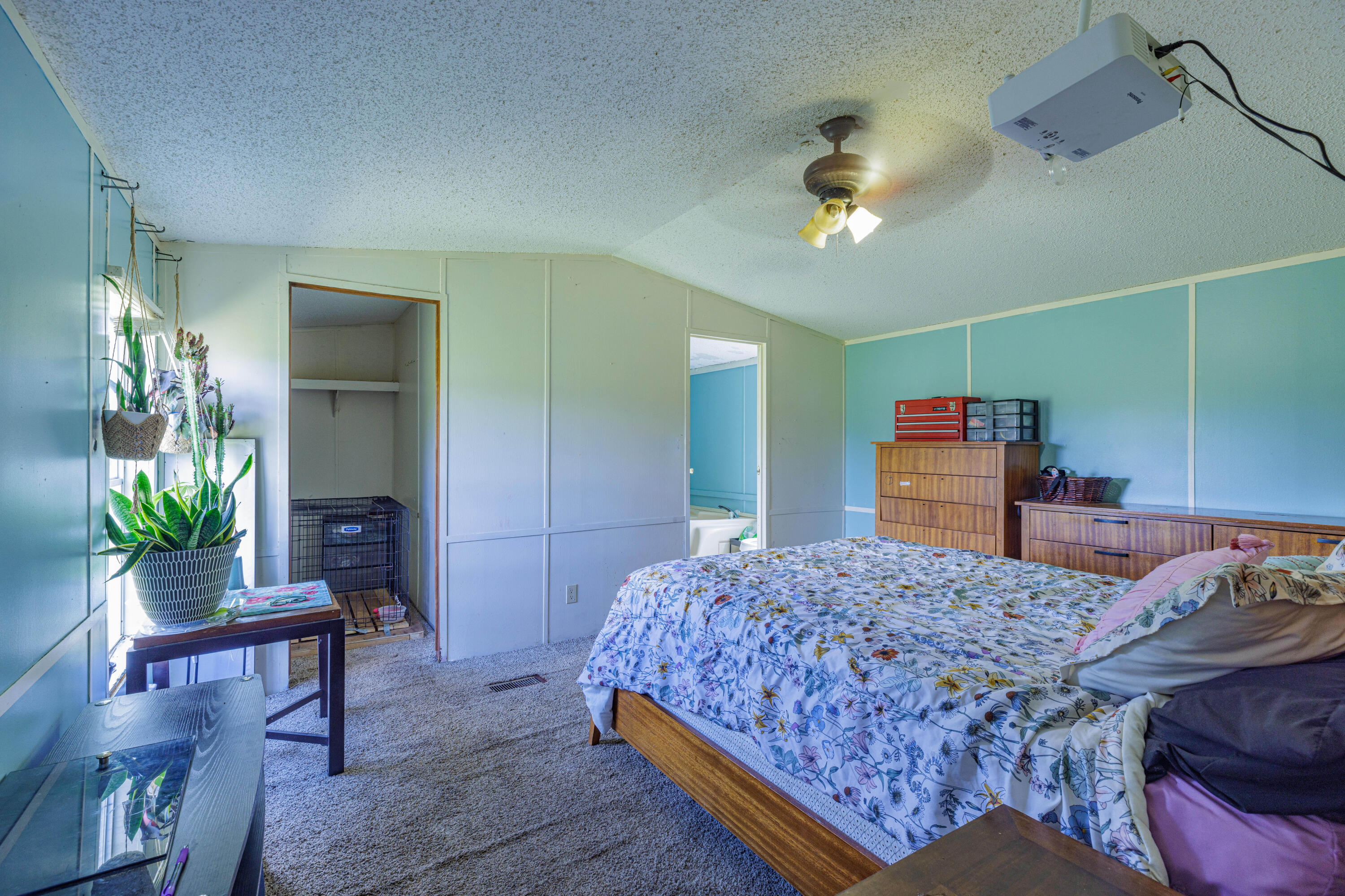 6337 Sherman Kennedy Road Baker, FL 32531 - Photo 12 of 17 a bedroom with a bed window and table chair