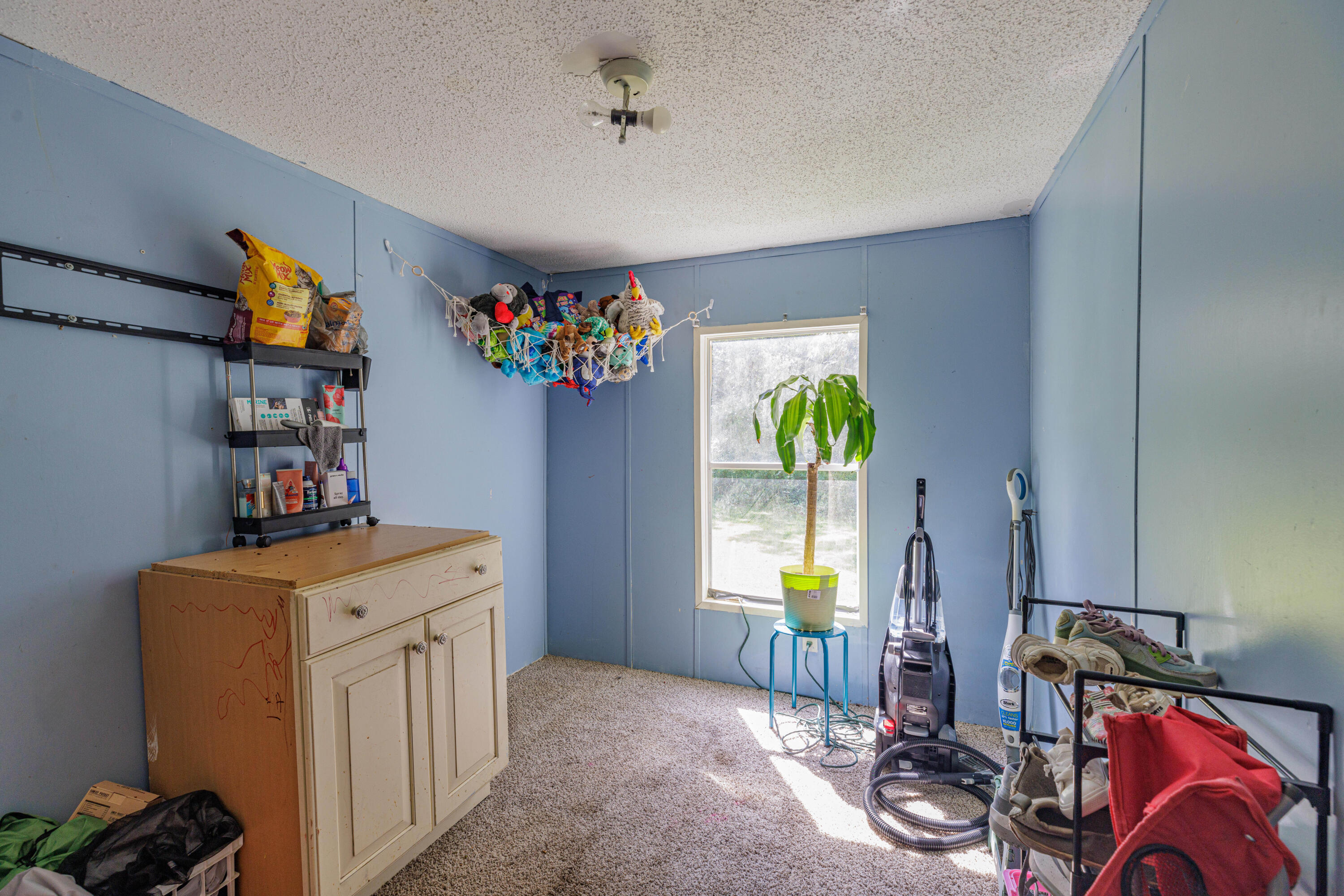 6337 Sherman Kennedy Road Baker, FL 32531 - Photo 15 of 17 a view of storage and utility room