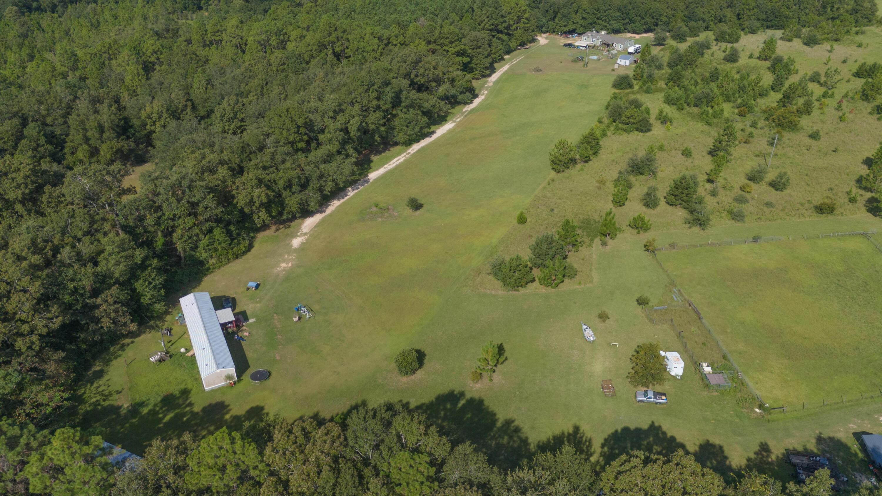 6337 Sherman Kennedy Road Baker, FL 32531 - Photo 2 of 17 a view of a residential houses