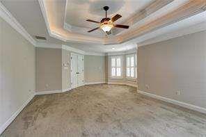 802 Pathview Court Dacula, GA 30019 - Photo 45 of 56 a view of an empty room with a ceiling fan