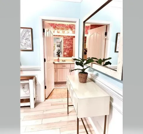 a kitchen with a sink stove and a refrigerator