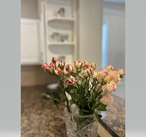 a vase of flowers sitting on a table