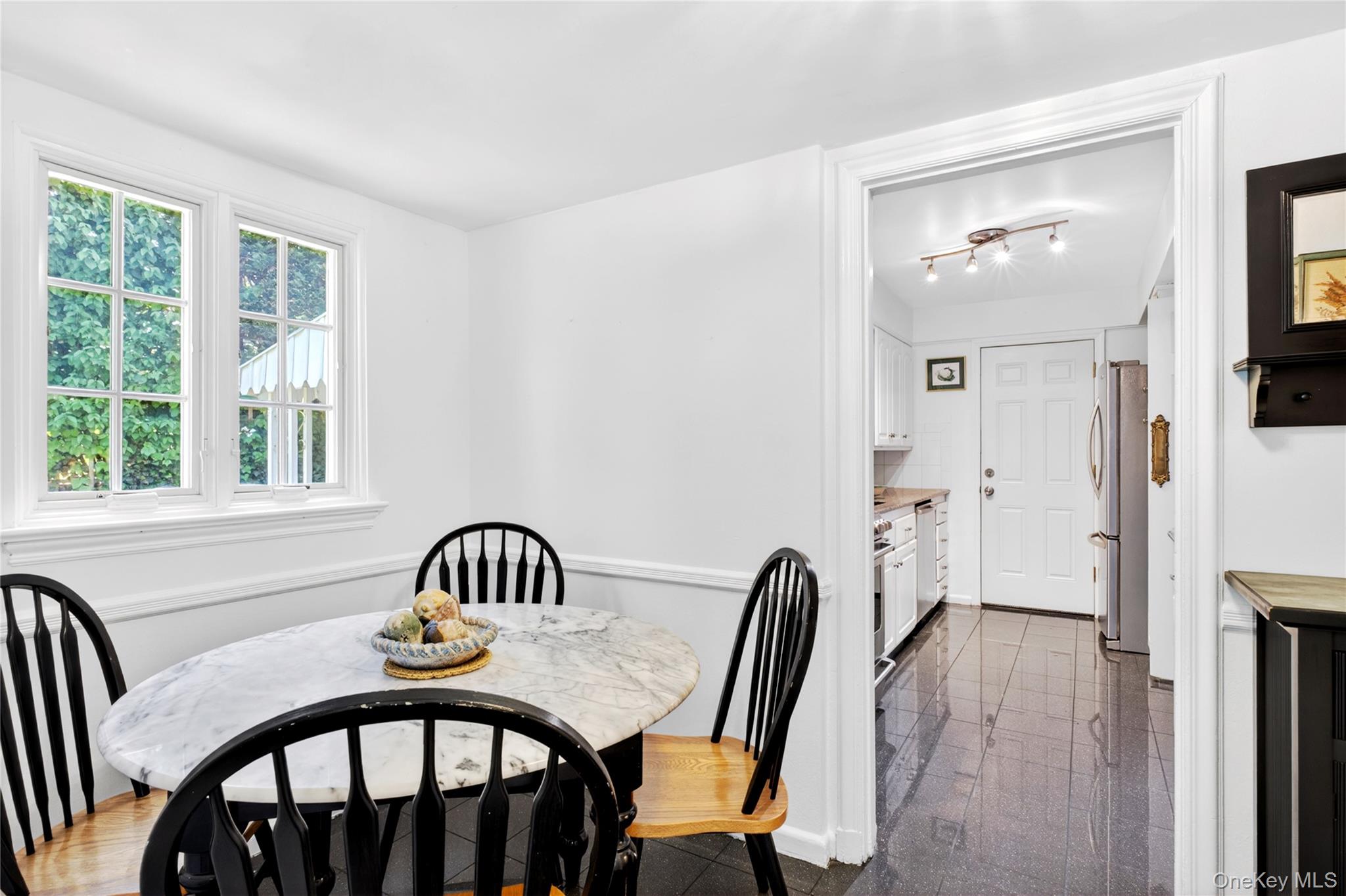 60 Mill Spring Road Manhasset, NY 11030 - Photo 9 of 18 a view of a room with furniture and windows