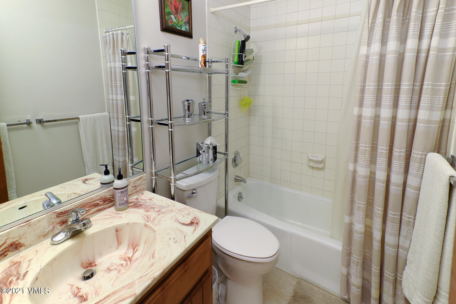 1480 Buffehr Creek Road, Unit 3A Vail, CO 81657 - Photo 12 of 17 a bathroom with a sink and toilet