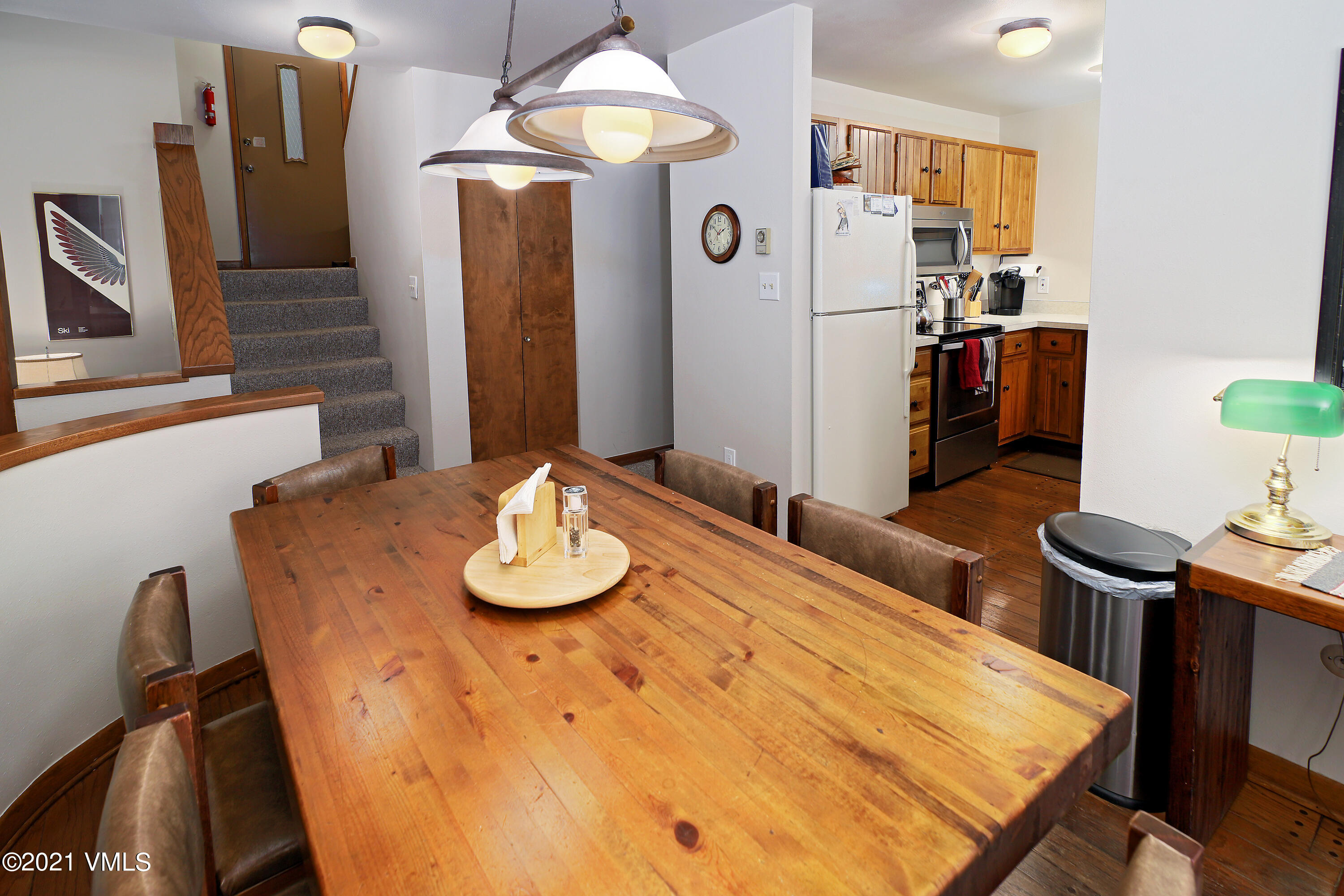 1480 Buffehr Creek Road, Unit 3A Vail, CO 81657 - Photo 6 of 17 a view of a dining room with furniture