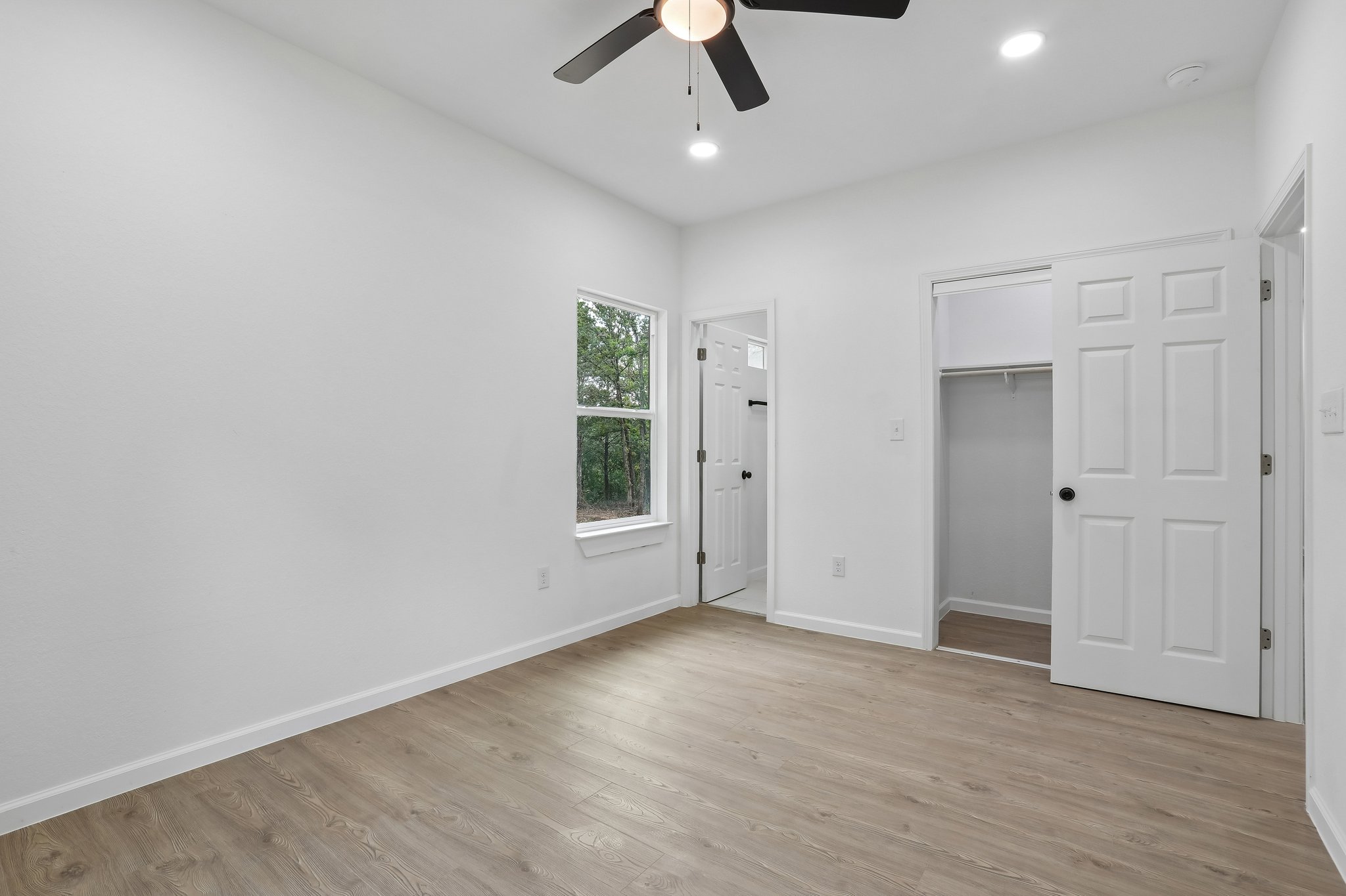 210 Flint Ridge Street Bastrop, TX 78602 - Photo 33 of 40 wooden floor in an empty room