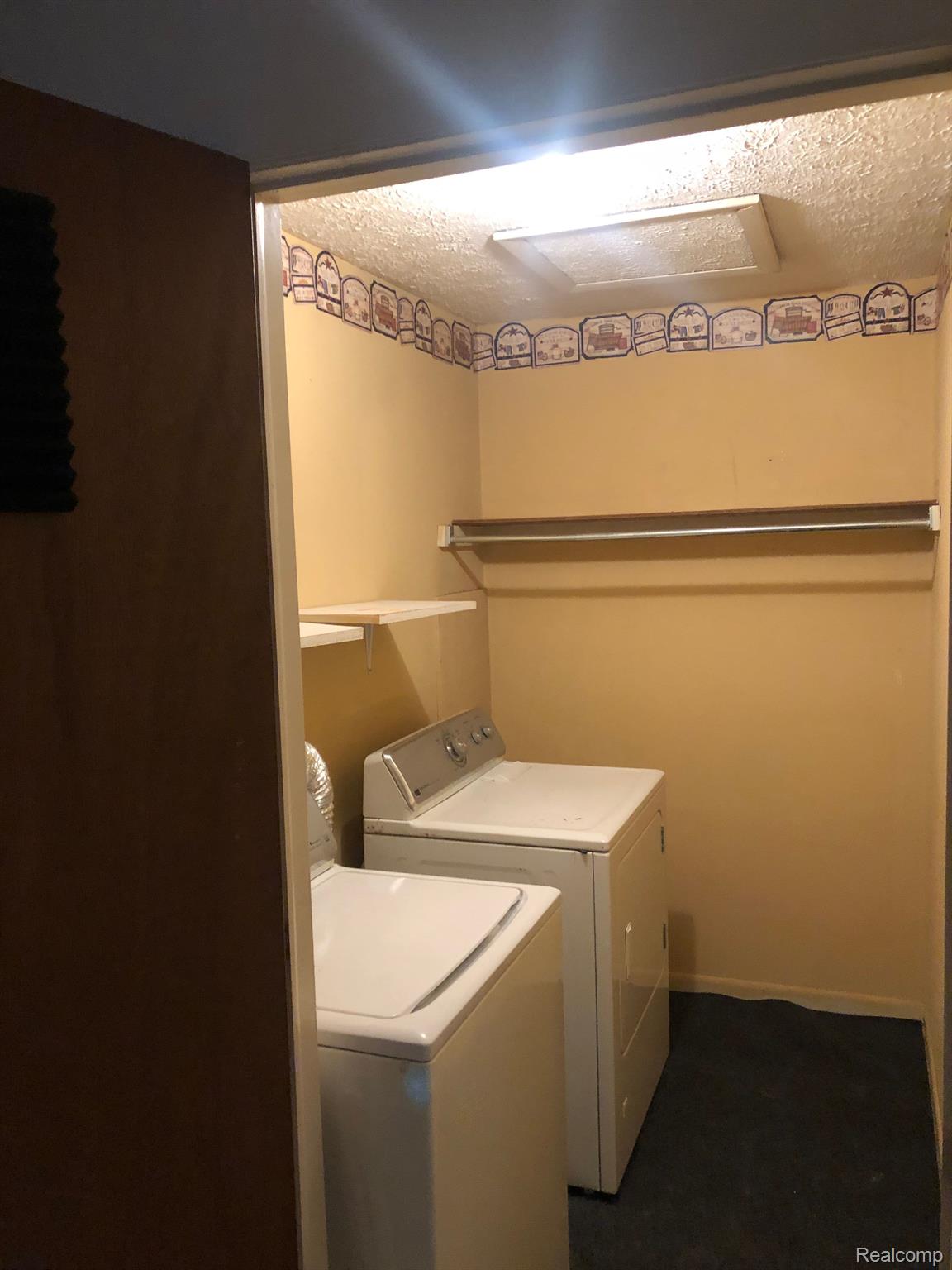 205 East Jolly Road, Unit 10 Lansing, MI 48910 - Photo 19 of 35 IN UNIT LAUNDRY ROOM