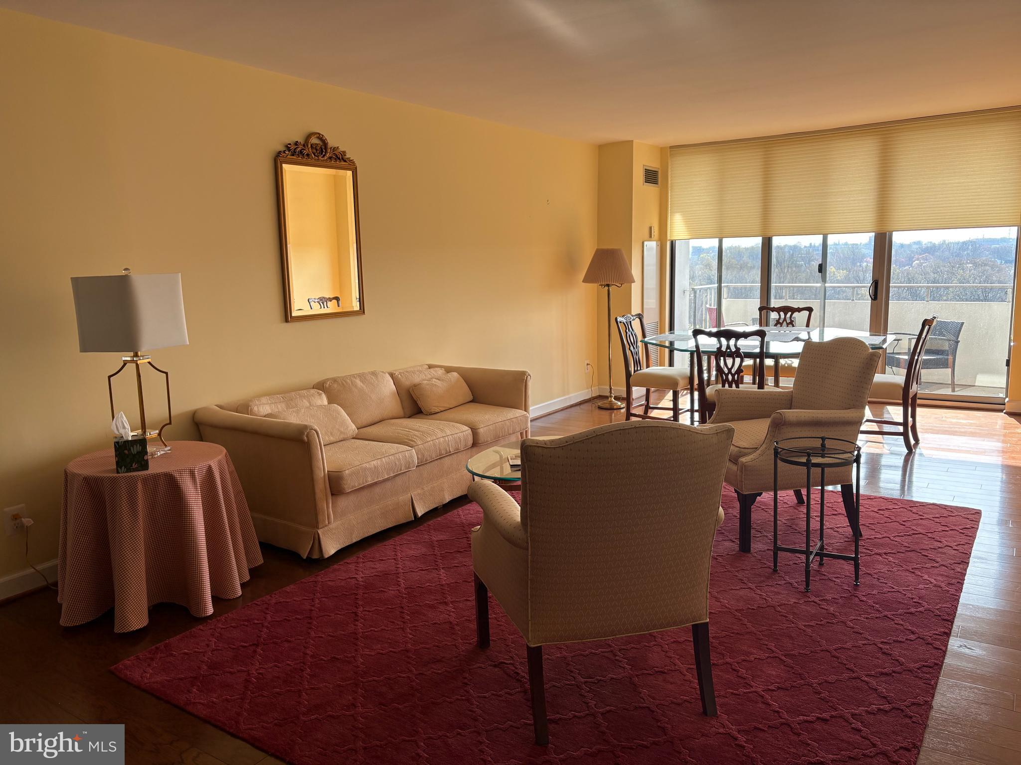 5101 River Road, Unit 1608 Bethesda, MD 20816 - Photo 17 of 38 living room /exit to balcony
