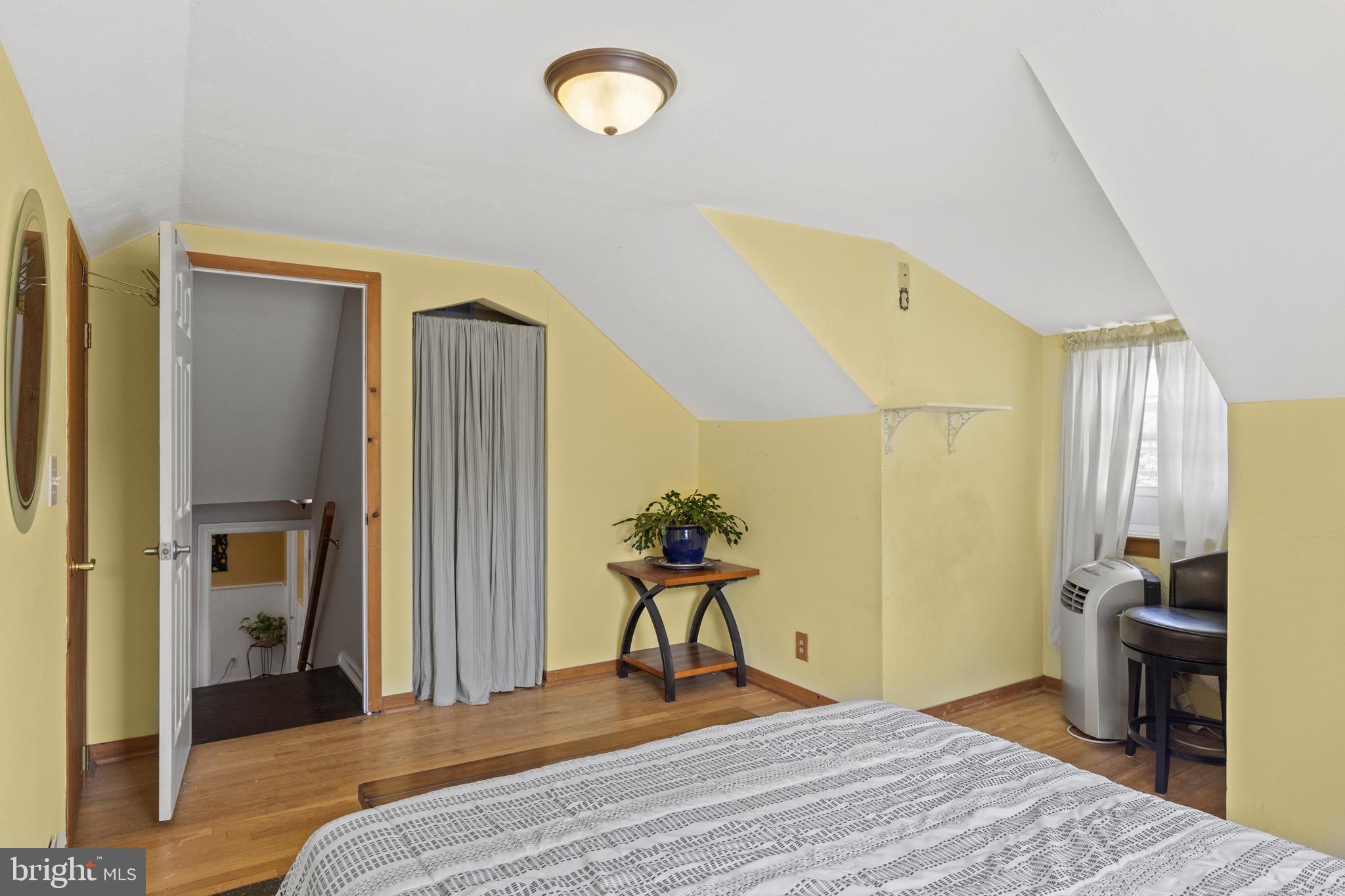 50 Miry Brook Road Hamilton, NJ 08690 - Photo 20 of 28 a bedroom with a bed and a chandelier