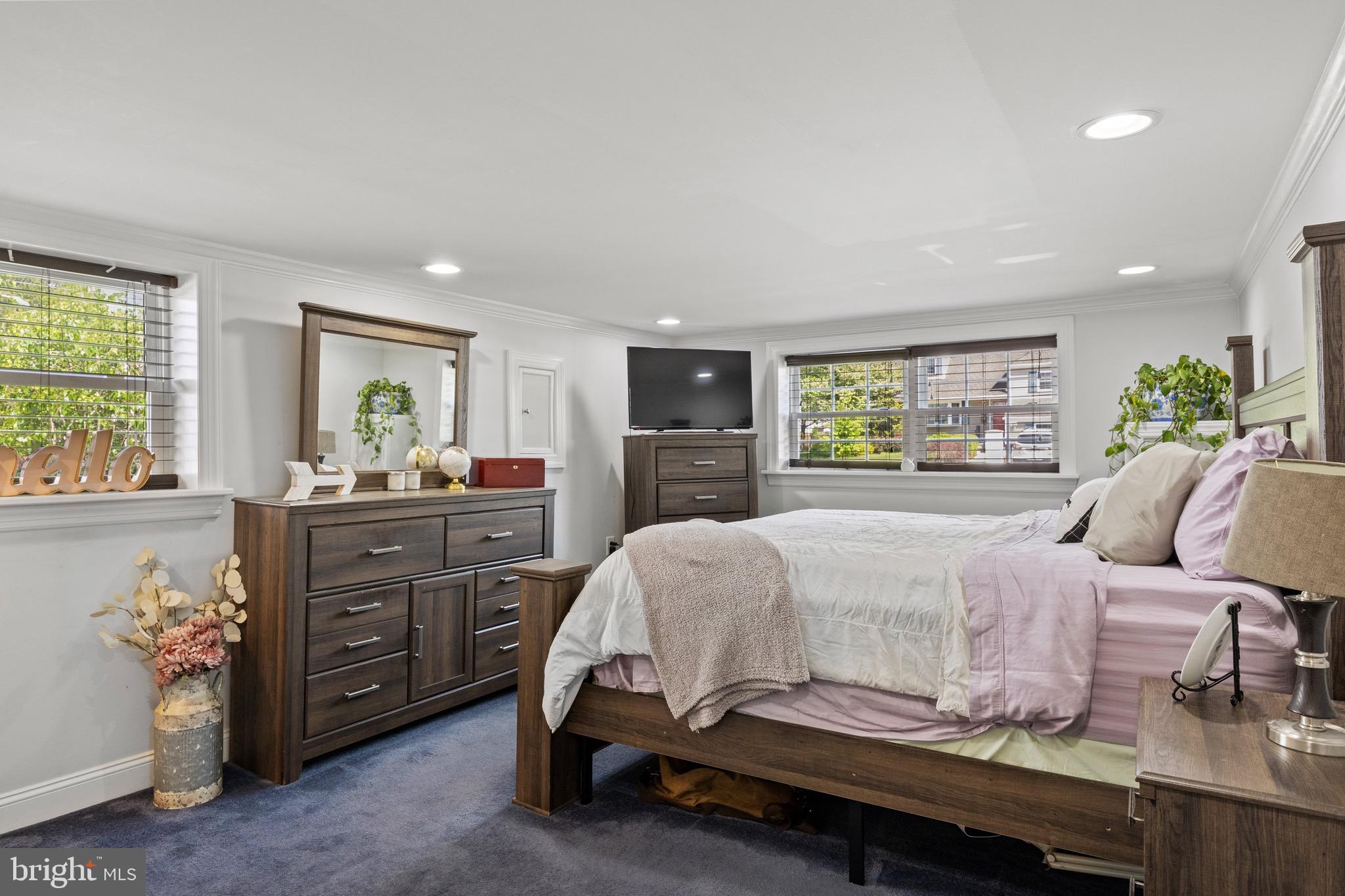 50 Miry Brook Road Hamilton, NJ 08690 - Photo 23 of 28 a bedroom with a bed and a dresser