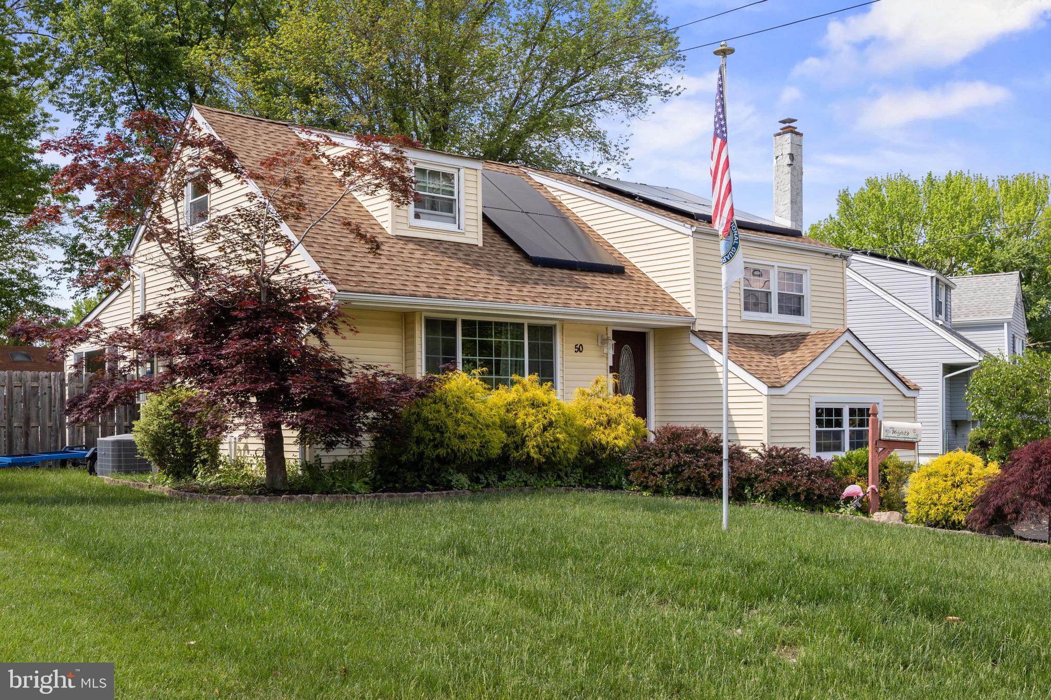 50 Miry Brook Road Hamilton, NJ 08690 - Photo 3 of 28 a view of a house with a yard and plants