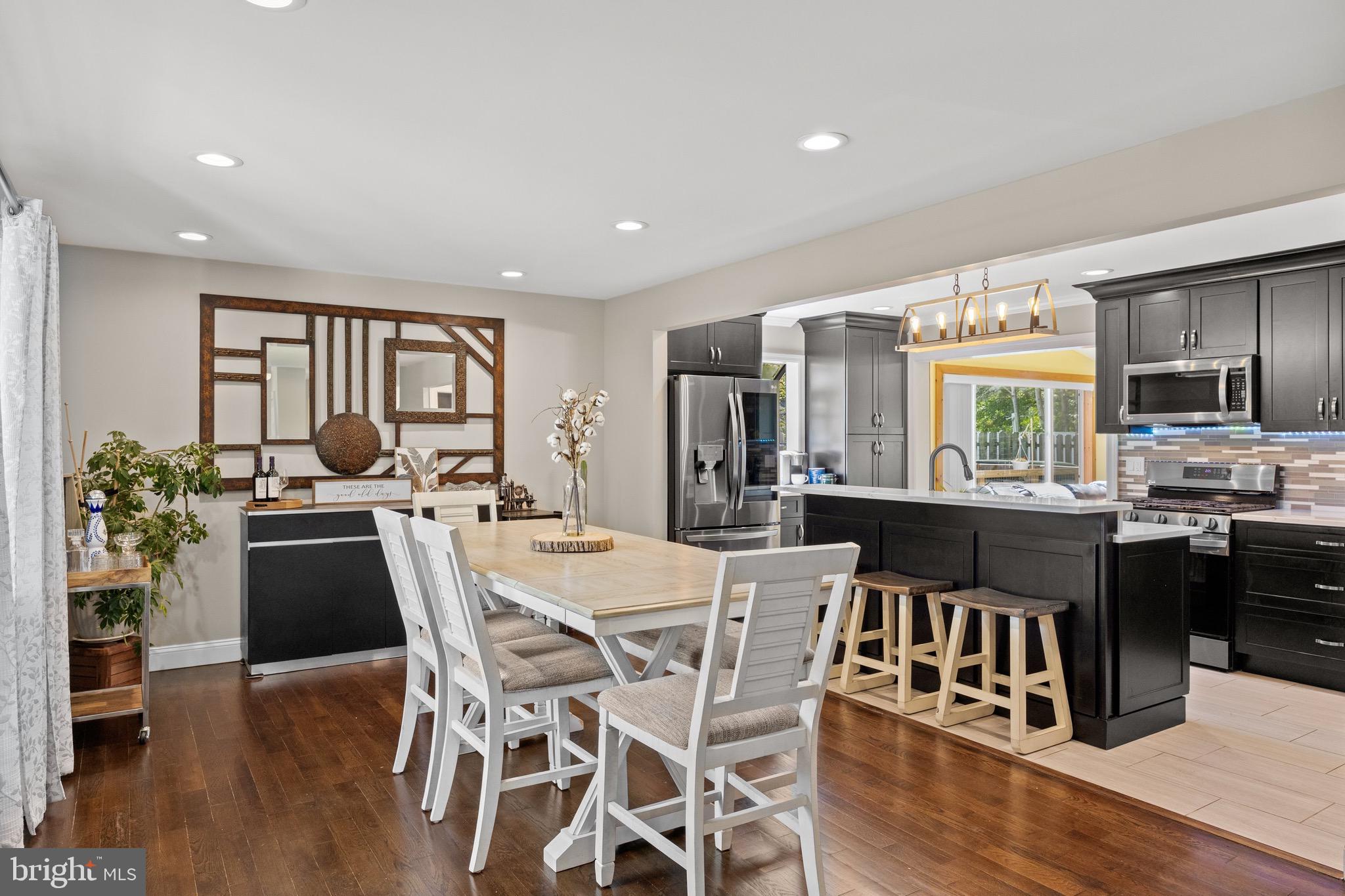 50 Miry Brook Road Hamilton, NJ 08690 - Photo 5 of 28 a kitchen with a table and chairs in it